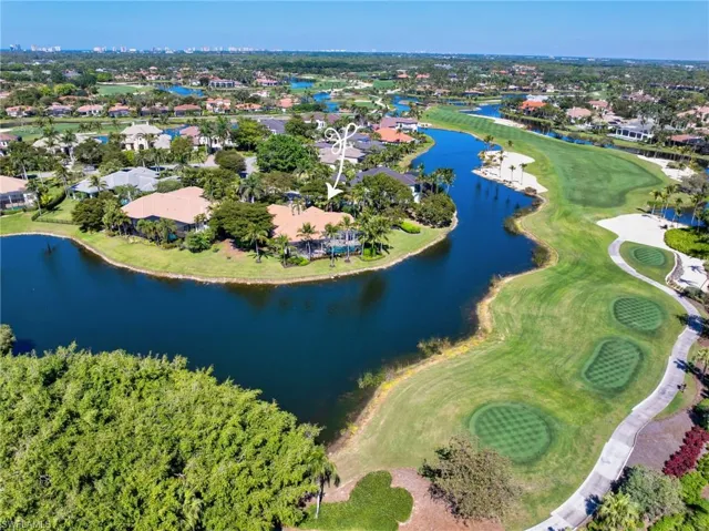 Large, pie-shaped 0.68 acre lot, with lake and golf course views.  Plenty of room to build on an extra bedroom and bath!