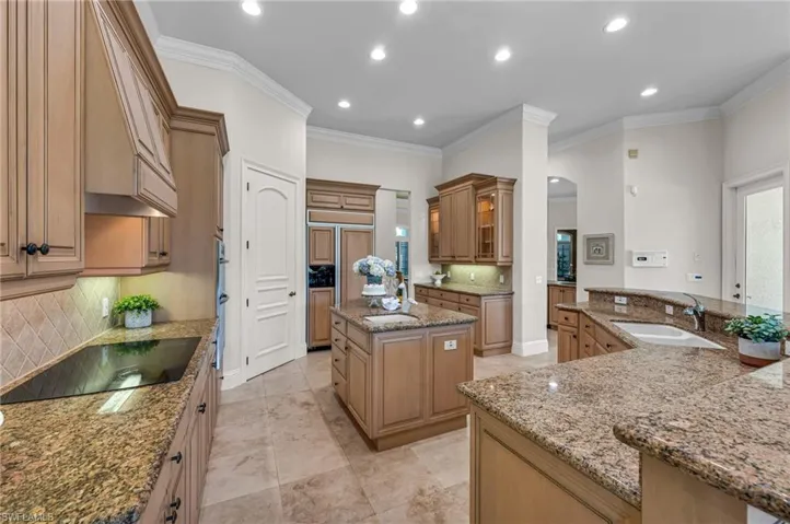 This expansive kitchen has a large, walk-in pantry, with plenty of storage for those Costco runs!
