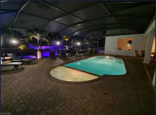 View of pool at night