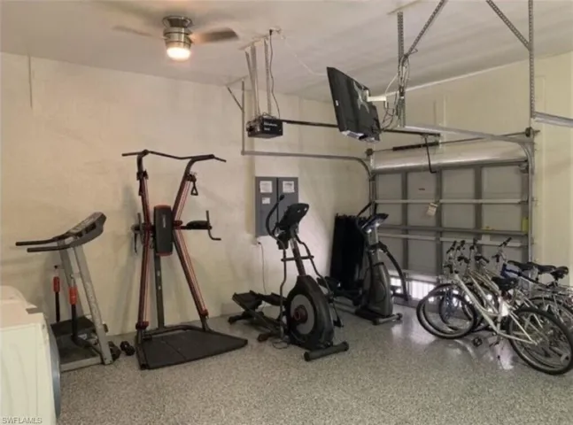 Exercise area featuring ceiling fan