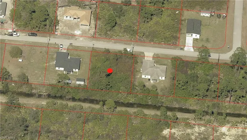Aerial overview of property's location with property boundaries highlighted