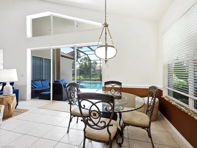 Dining area off kitchen & eat-at bar adds additional entertainment space.