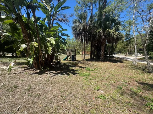 View of yard with a playground