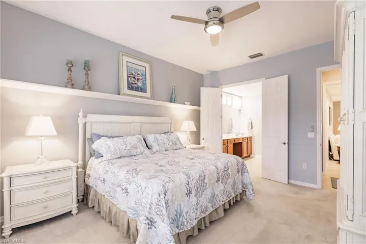 Primary bedroom featuring connected bathroom