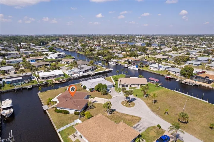 Aerial view with a water view and a residential view