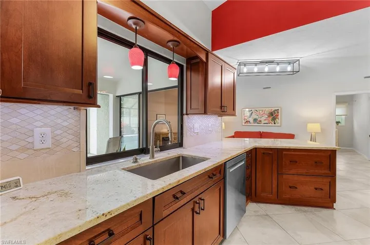 Wood cabinets, new fridge, stainless appliances