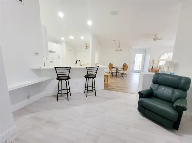 Family Room Facing Breakfast Bar & Kitchen