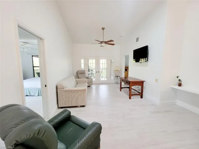 Family Room with French Doors to the Screened Lanai - View #2