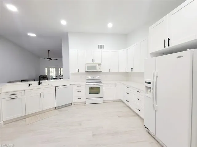 Kitchen Open to the Family Room - View #2