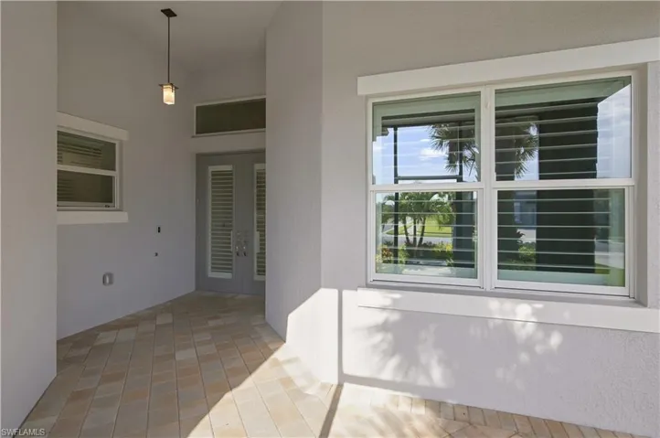 cover and screened lanai, glass front doors