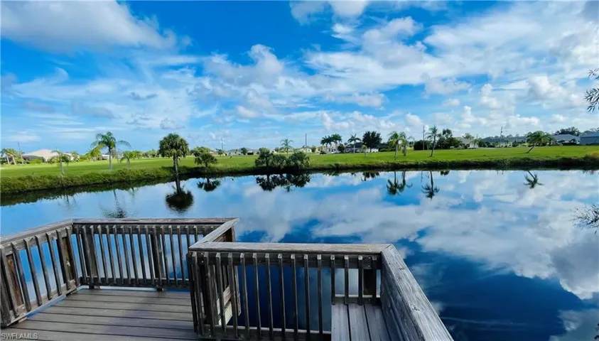 Community Park Dock area featuring a water view