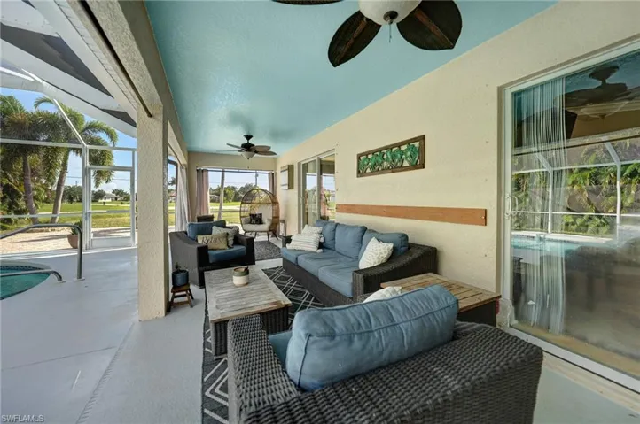 View of patio / terrace featuring outdoor lounge area, a lanai, and ceiling fan
