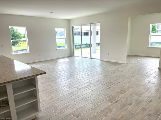 Open Great Room-  gorgeous plank  ceramic tile flooring