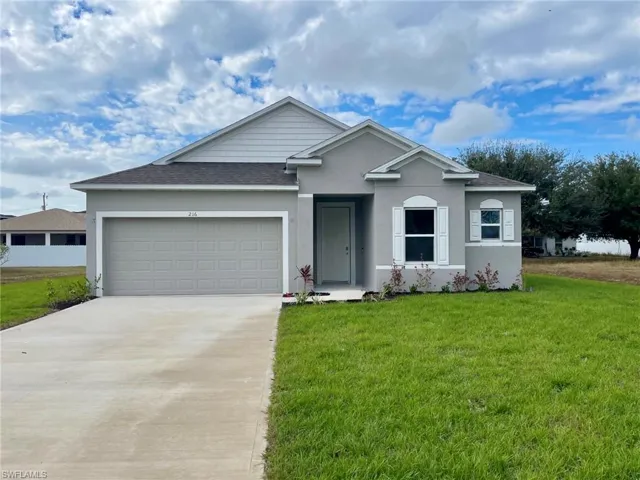 Block construction, landscaping, 2 car garage