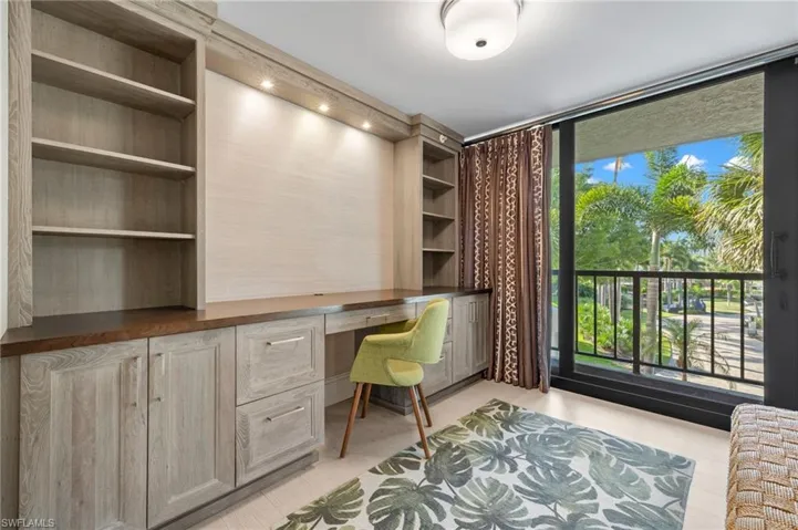 Office featuring built in desk