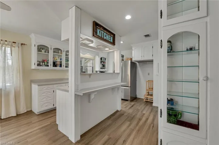 Kitchen with Cooking Island and Curio Storage