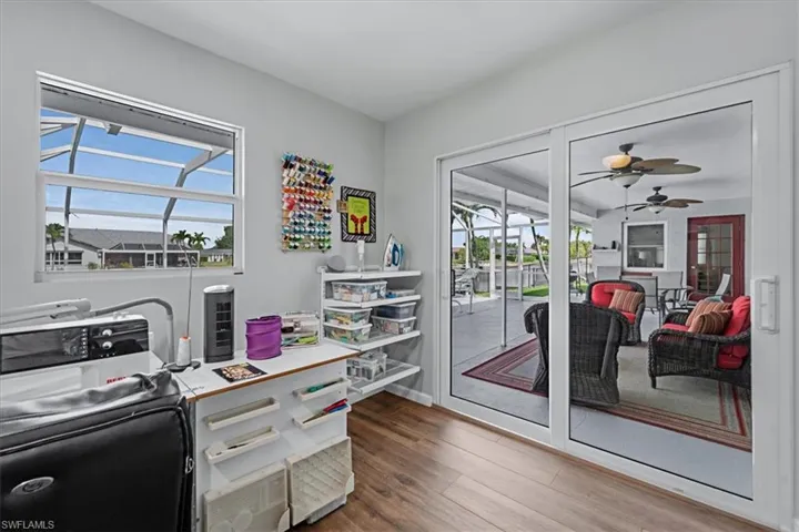 Interior room featuring wood look Tile Flooring and light gray walls