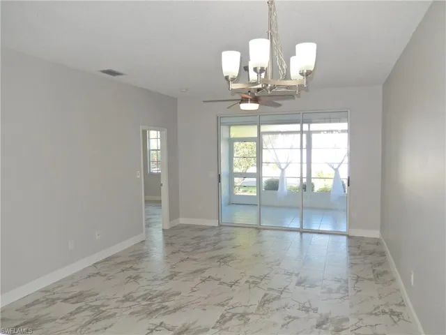 Main living dining with an inviting chandelier