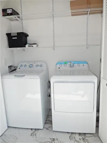 Washroom featuring tile floors