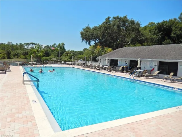 Swimming pool with a patio area