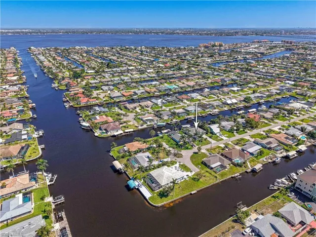 Aerial view with a residential view and a water view