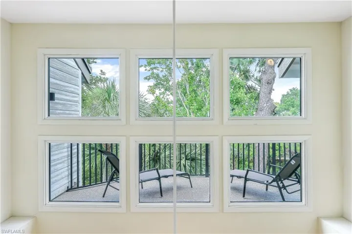 Close up of upper level windows - this deck is perfect for gazing at the night sky.