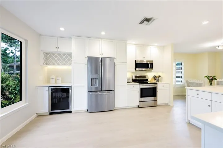 Gorgeous kitchen with new cabinetry and quartz countertops.
