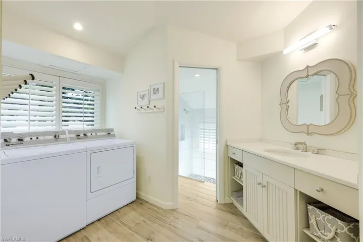 Primary en suite convenient to laundry and walk in shower.
