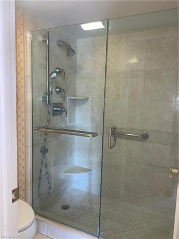 Primary Shower with frameless doors.