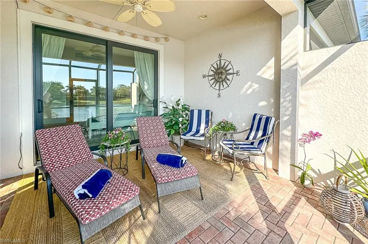 View of terrace featuring ceiling fan