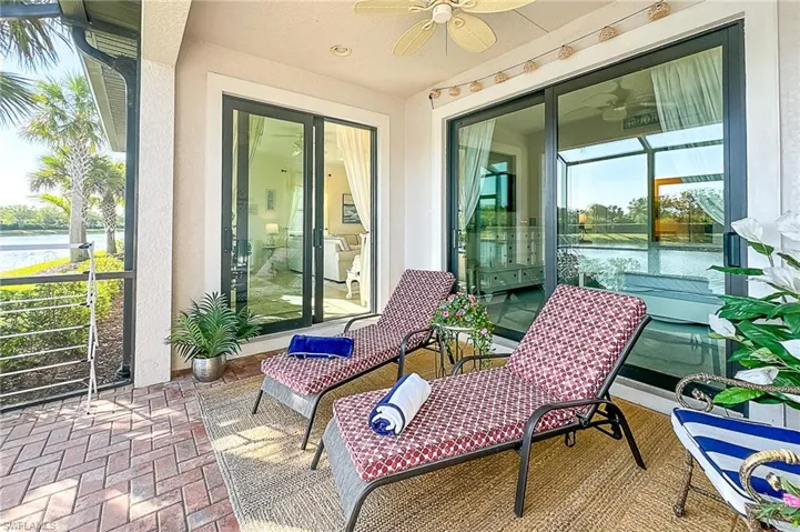 Sunroom featuring ceiling fan