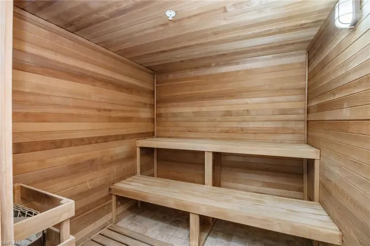 Sauna with wood ceiling and wooden walls