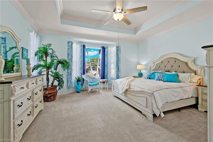 Massive primary suite with coffered ceiling