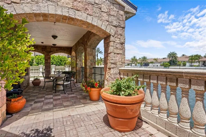 View of patio with outdoor dining area