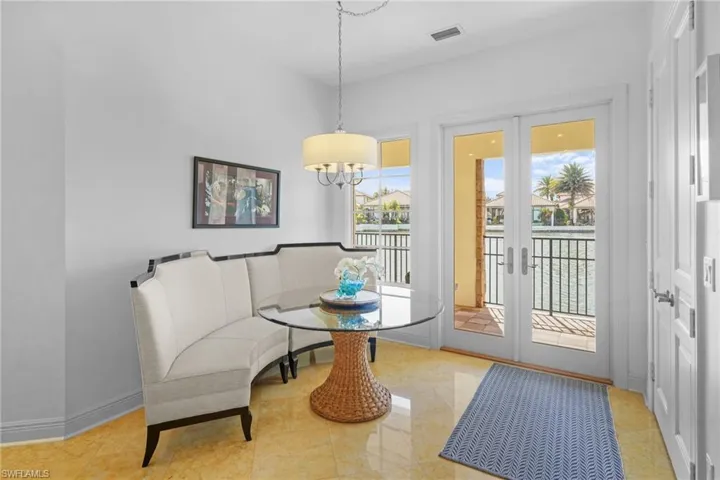 Doorway featuring french doors and baseboards