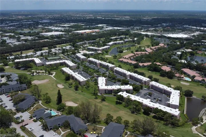 Aerial perspective showcasing a community of multi-story residential buildings