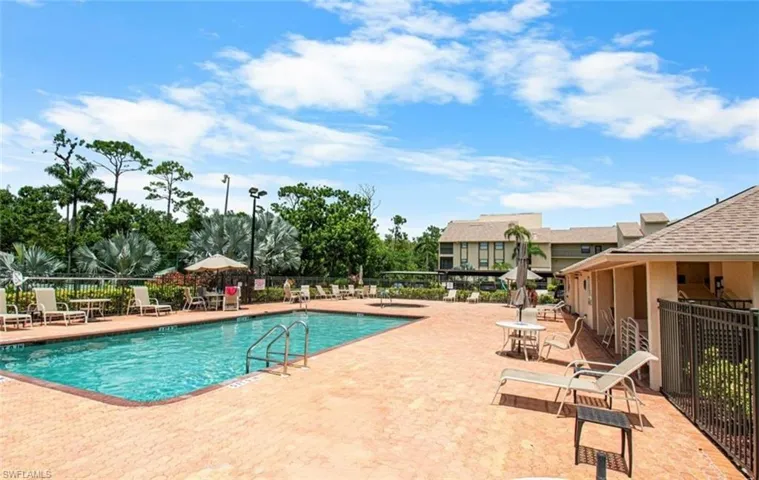 Community pool with a patio area
