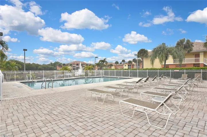 Community pool with a patio area