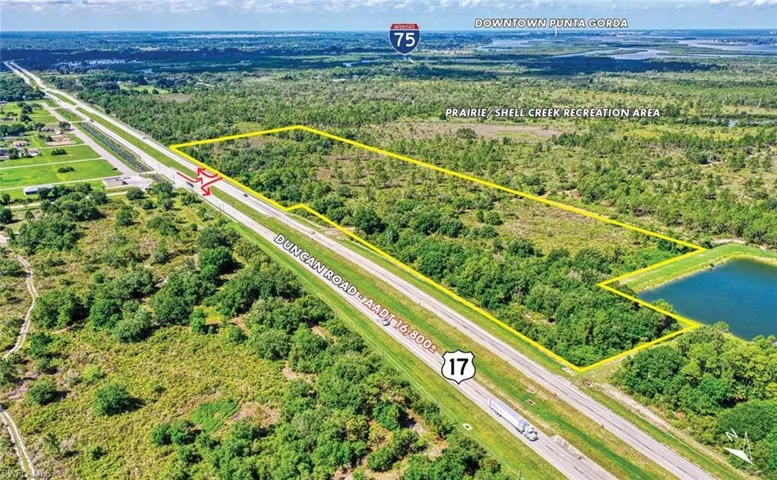 Aerial overview of property's location with property parcel outlined