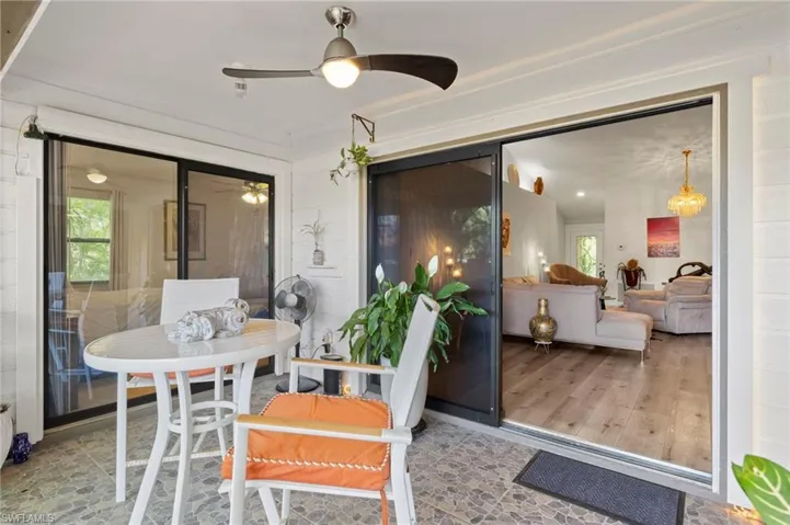 Beautiful screened lanai leads to primary bedroom and living area