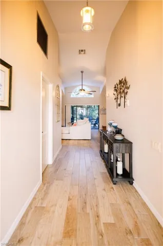 Front Entry hall  flooring and lofted ceiling