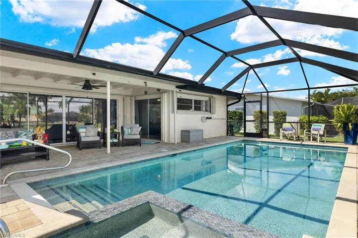 View of pool, lanai, and patio area