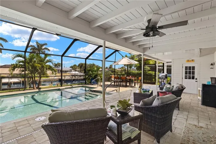 View of pool and hot tub