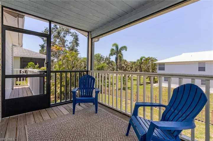 Screened Porch with wrap around porch on west side.