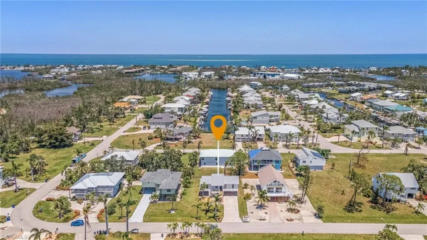 Charlotte Harbor in the background.  Quick access via community boat ramp.