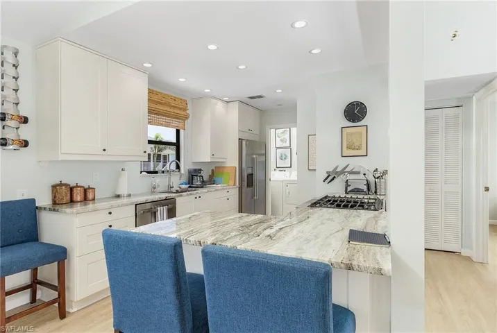 Kitchen was remodeled with all new cabinets, granite, and gas range.