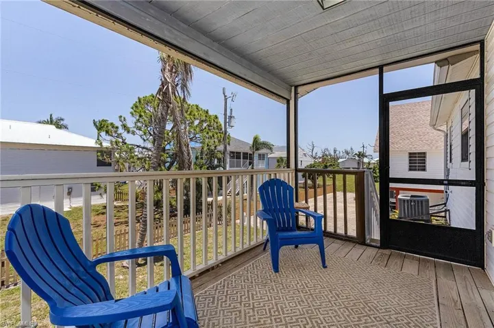 Screened Porch is off of the dining room.  There is a staircase leading downstairs.