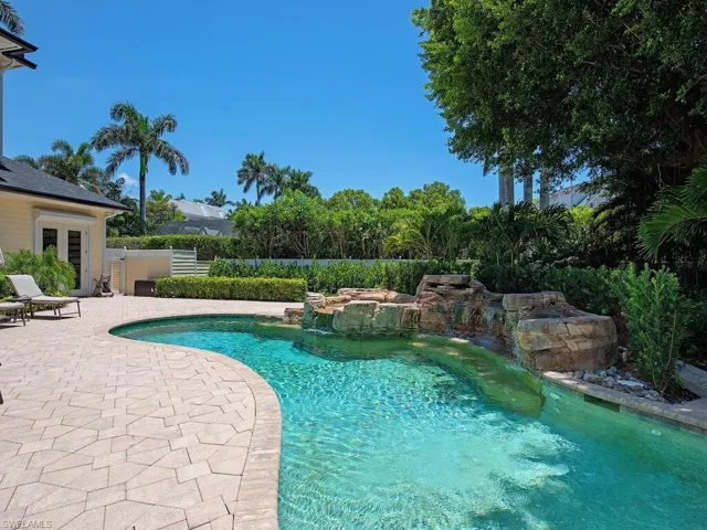 Outdoor pool featuring a patio area