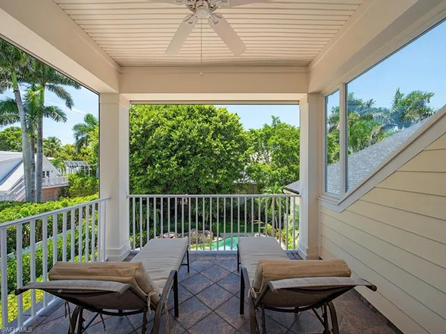 Patio / terrace featuring a ceiling fan