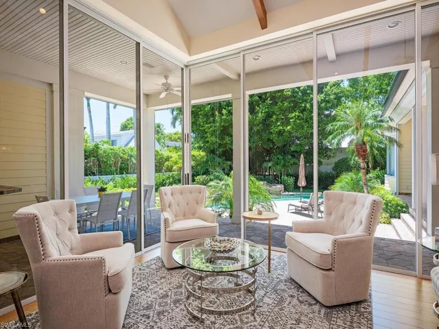 Sunroom featuring hardwood / wood-style flooring